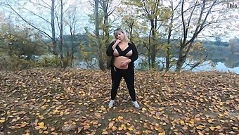 A Milf With A Big Chest Enjoys Herself In A Public Park Near Lake